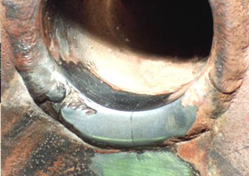 Fig. 4 — Heat exchanger tube sheet after metallographic preparation for the replica.