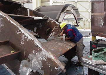 Fig. 6 — Replica being made on equipment welding still in the manufacturing stage.